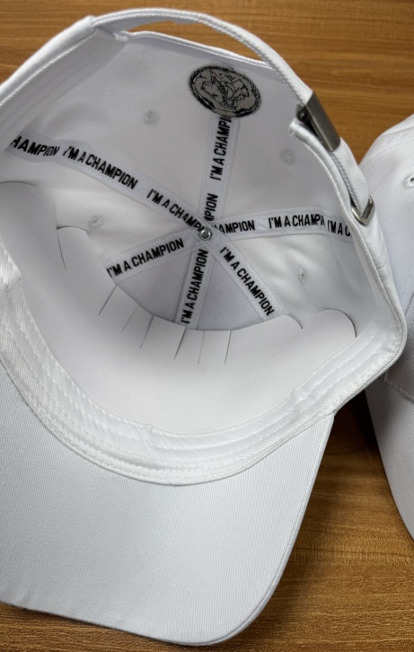 The cap is white I am a champion   2024.12